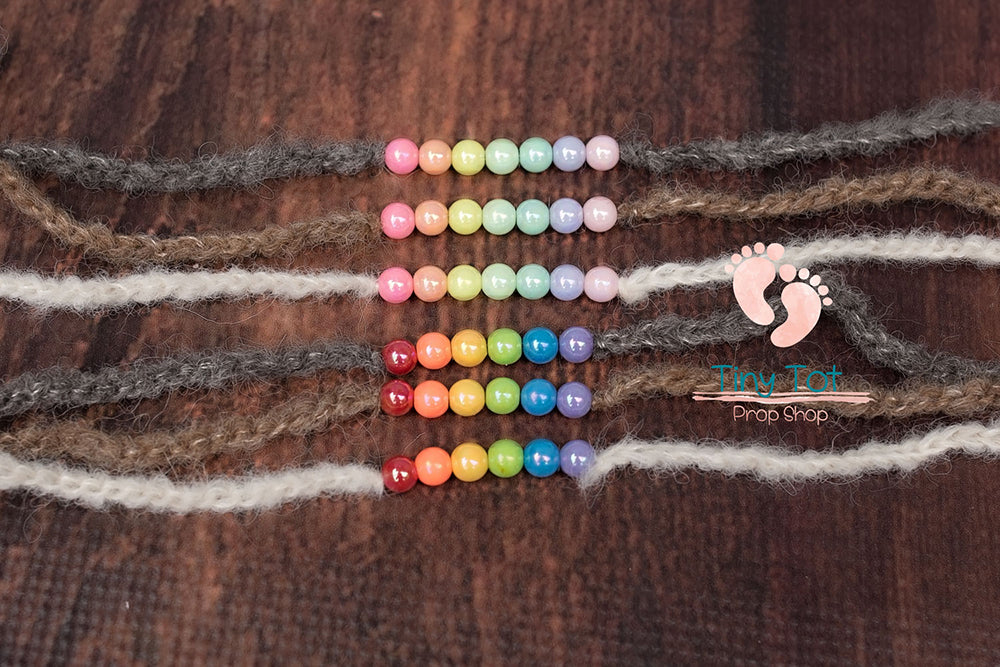 Rainbow Tieback - Yarn Bead Tieback - Knit Tieback - Yarn Headband - Rainbow Headband - Newborn Photo Props Canada - Tiny Tot Prop Shop - Canadian Photography Props - Rainbow Props - Rainbow Baby Photo Props - Rainbow Baby - Rainbow Photo Props - Rainbow Photography Props